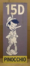 Pinocchio featured below "15D" on a vibrant purple background, with his name showcased Disney-style at the bottom.