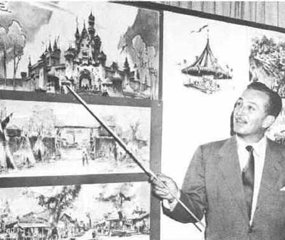 Walt Disney, in a suit, presents an early Disneyland castle sketch on a board surrounded by other concept art.