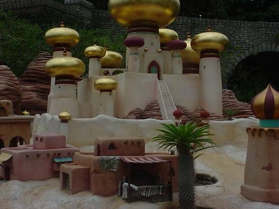 Storybook Land Canal Boats’ palace mini-model, golden domes gleaming amid desert-themed buildings—a Disneyland fan favorite.