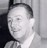 Charismatic man in a classic suit and mustache, reminiscent of Walt Disney, stands before a curtain, capturing Disney magic.