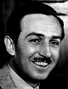 Classic black-and-white portrait of Walt Disney, smiling in a suit jacket, evoking the magic behind beloved Disney parks.