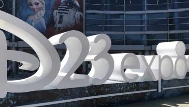 The iconic D23 Expo sign welcomes fans outside the convention center, with Elsa and R2-D2 banners celebrating Disney magic.