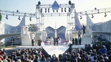 Disney fans gather before the castle for a lively Star Tours 35th anniversary show with beloved characters and a festive ribbon cutting.