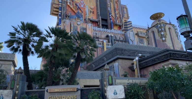 Mission: BREAKOUT! at Disney California Adventure, the vibrant Guardians of the Galaxy ride tower framed by swaying palm trees.