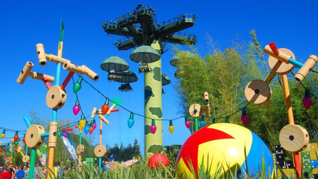 Toy Story Playland at Disneyland Paris bursts with oversized toys, lush landscaping, and the exciting Toy Soldiers Parachute Drop.