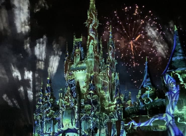 Cinderella Castle spectacularly glows with projections and fireworks during Disney Enchantment at Magic Kingdom.