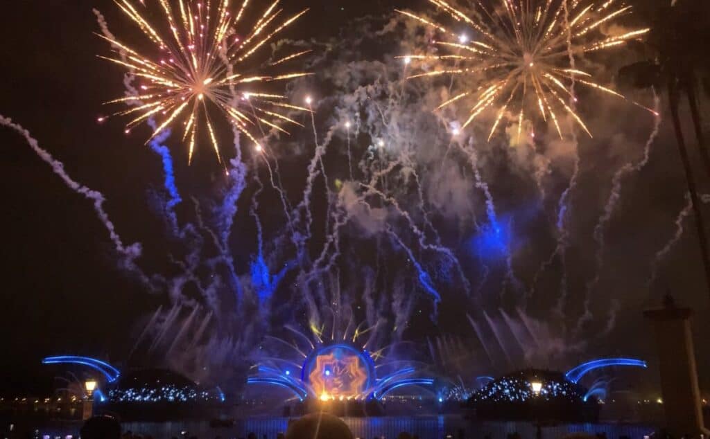 Fireworks dazzle over EPCOT’s Harmonious stage, where blue and yellow lights set the scene for this unforgettable nighttime spectacular.