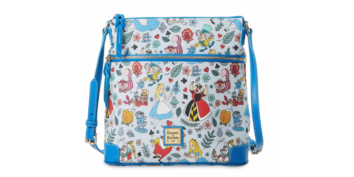 Crossbody bag with vibrant Wonderland characters and blue trim, topped with the iconic Dooney & Bourke Alice label.