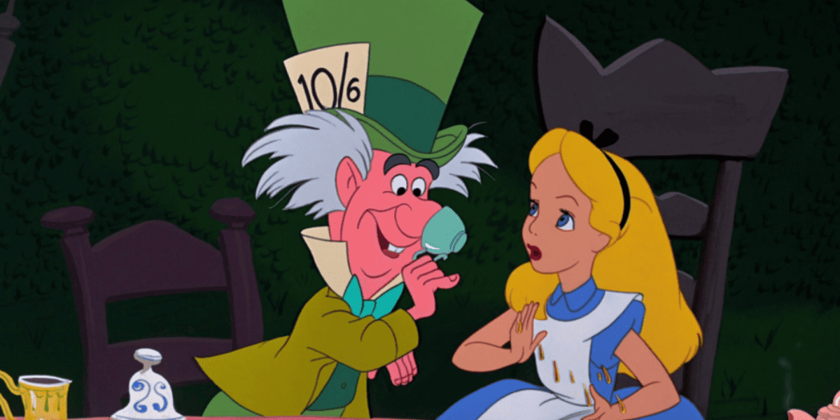 The Mad Hatter greets Alice at her Wonderland tea party; Alice clutches her Dooney & Bourke bag, looking surprised and hesitant.
