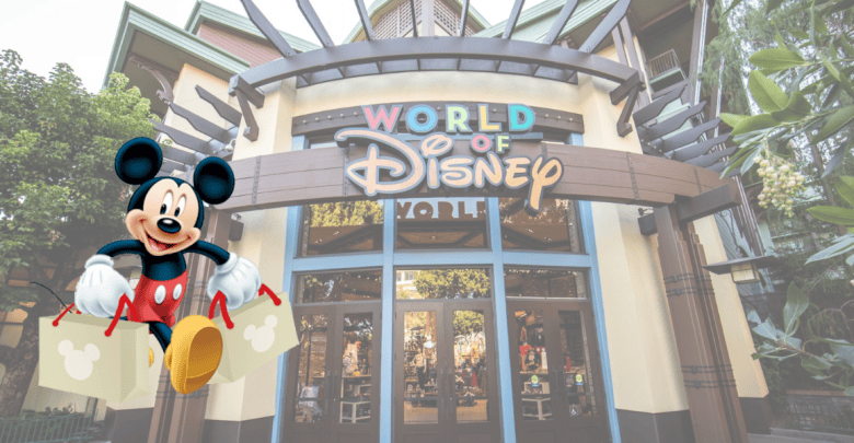 An entrance to the World of Disney store with a large sign above the doors. A joyful Mickey Mouse, holding shopping bags, is superimposed on the left side of the image, welcoming visitors. The store features colorful architectural elements and various Disney merchandise inside.