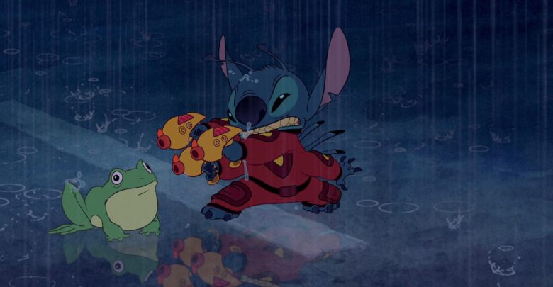 A blue alien creature wearing red armor stands in the rain, holding yellow toy guns like a character from Disney movie remakes, while a green frog sits on the wet ground. Rain creates ripples and reflections on the surface.