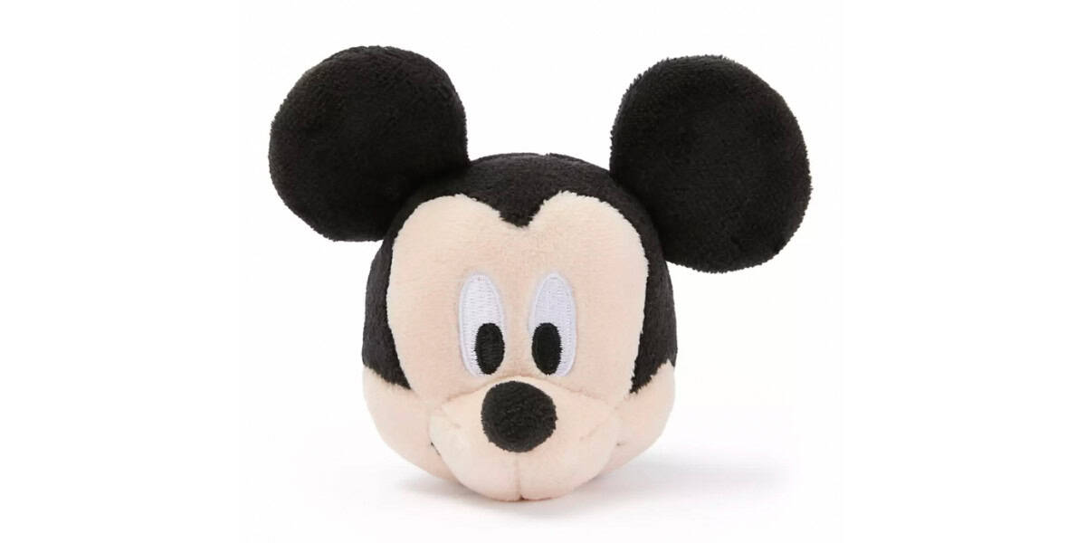 A plush toy head resembling a classic cartoon mouse character, with large round black ears, a beige face, embroidered eyes, and a small nose, set against a plain white background.