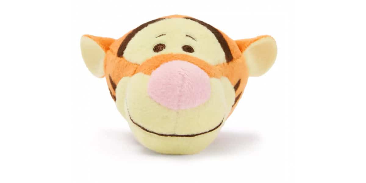 A plush toy head of Tigger from Winnie the Pooh, featuring orange and black stripes, a big pink nose, beige face, and soft fabric, viewed from the front against a white background.