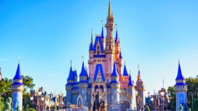 The Mickey and Walt statue in front of Cinderella's Castle inside Disney's Magic Kingdom