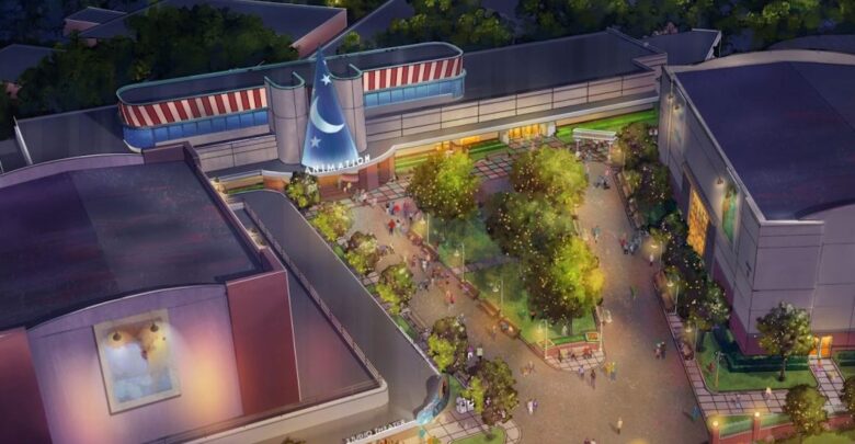 Nighttime aerial of Hollywood Studios’ plaza aglow, pathways and buildings pop—could this tease an Animation Courtyard revamp?.