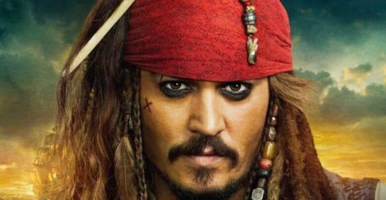 Jack Sparrow, with his signature red bandana, braided hair, and heavy eyeliner, gives an intense look to park guests.