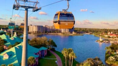 The Disney Skyliner in operation over Caribbean Beach at Disney World.