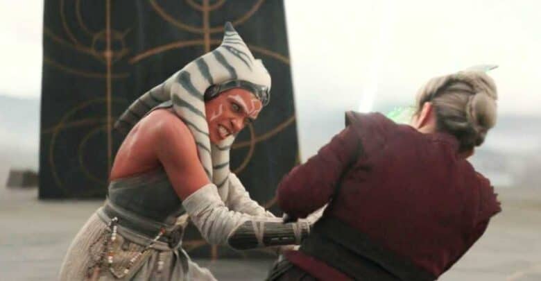 Ahsoka Tano lightsaber dueling Shin Hati in a Star Wars battle.