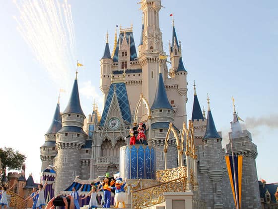 Cinderella Castle lights up with fireworks as classic Disney characters wow guests on stage, delivering true park magic.