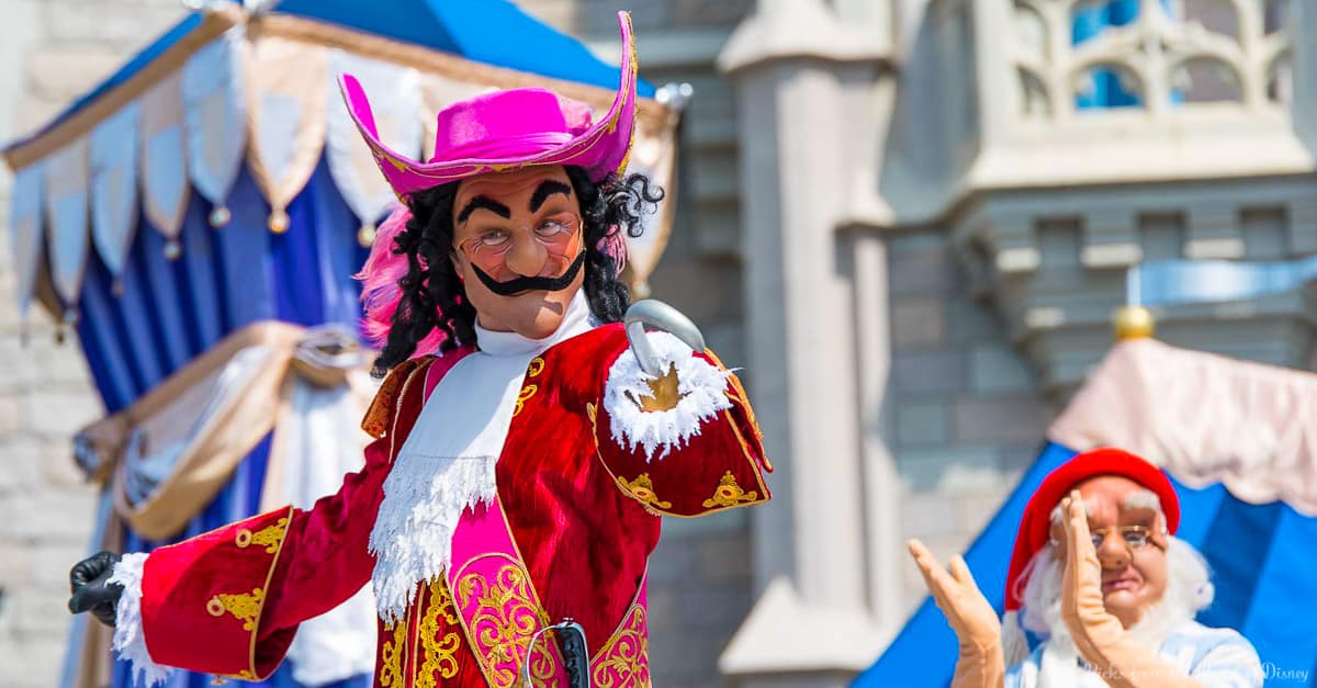 Captain Hook, dressed in his signature red coat and hat, entertains guests live on stage at Walt Disney World.