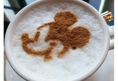 Cappuccino topped with a cocoa Mickey Mouse design on the foam—an Instagram-perfect treat for Disney World fans.