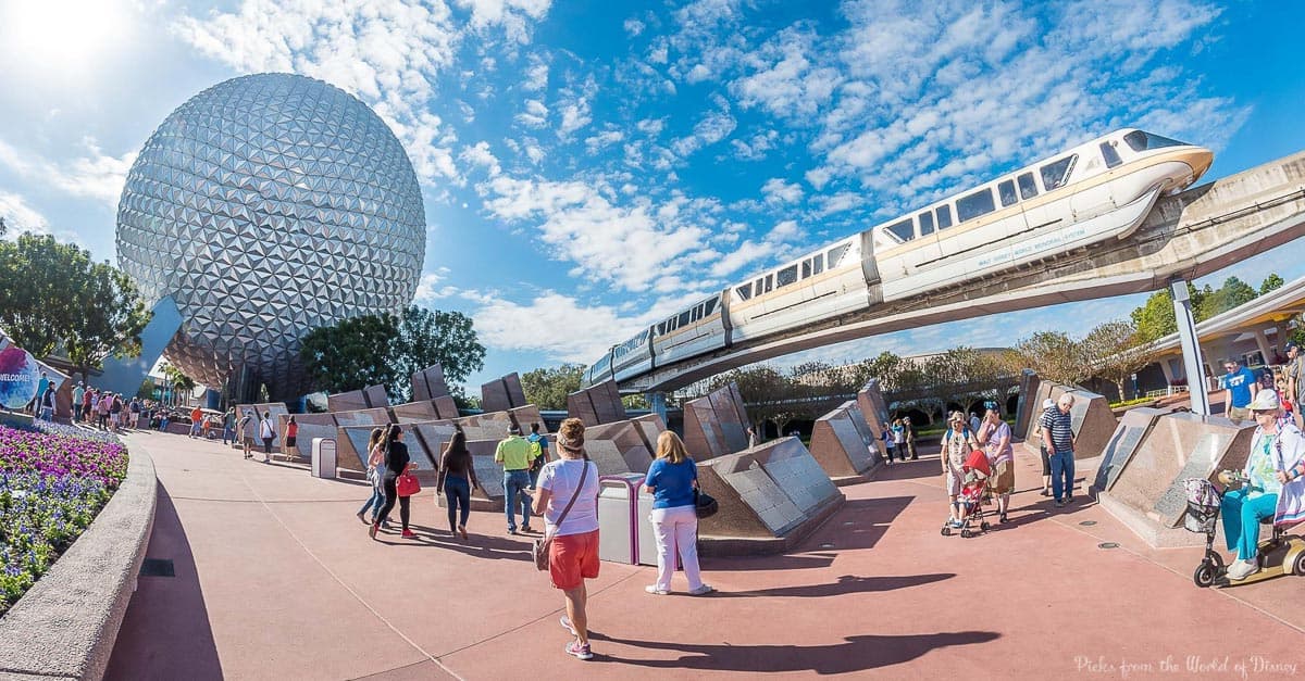 A monorail glides past Epcot’s iconic sphere as guests explore under the sun, soaking up Disney World excitement and insider tips.