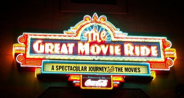Bright neon "The Great Movie Ride" sign at Walt Disney World beckons guests: "A spectacular journey into the movies.