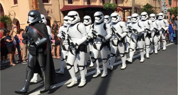 Stormtroopers and Captain Phasma lead an epic march at Disney's Hollywood Studios, thrilling fans in this exclusive Star Wars event.