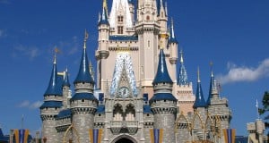 Cinderella Castle shines with blue rooftops and soaring spires, welcoming guests to the heart of Walt Disney World enchantment.
