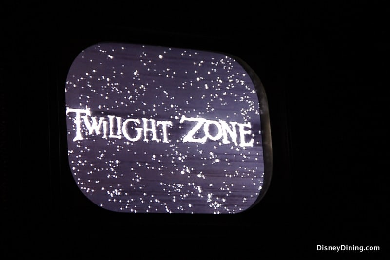 The Twilight Zone title glows amid white stars onscreen, evoking the kind of magic you’ll find at Disney’s Hollywood Studios.