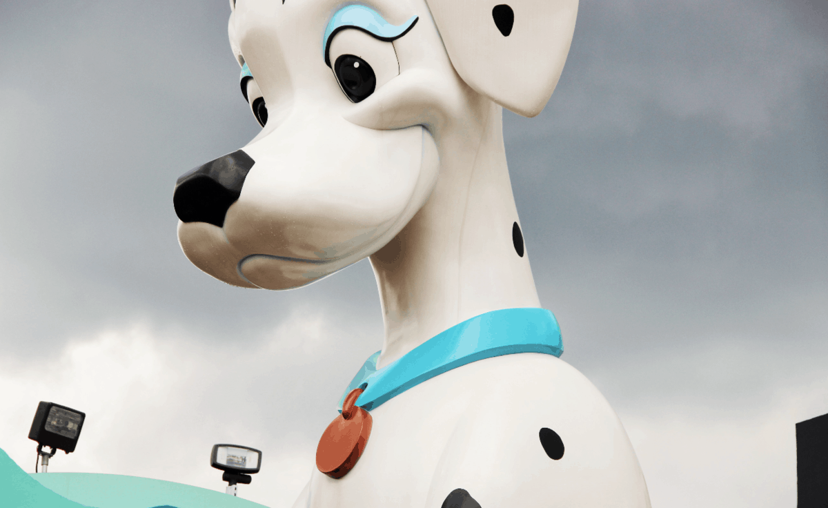Giant cartoon Dalmatian statue with blue collar and red tag at Disney’s All-Star Movies Resort, perfect for family photo ops.