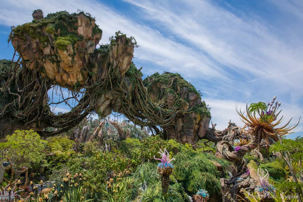 Pandora’s floating mountains tower over vibrant alien flora, capturing Animal Kingdom’s magic under a sky of wispy clouds.