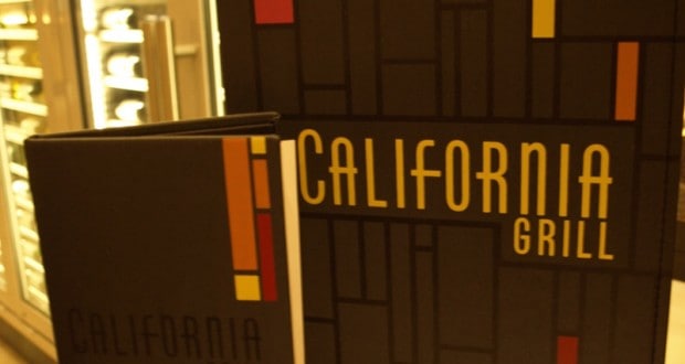 California Grill menus with sleek geometric designs and bold yellow text, reflecting its chic Disney resort atmosphere.