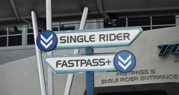 Single Rider and FastPass+ signs at the Disney World entrance—must-know tips for theme park fans optimizing their visit.