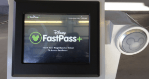 FastPass+ kiosk at Disney World with step-by-step instructions and iconic Mickey scanner, ideal for seamlessly booking rides.