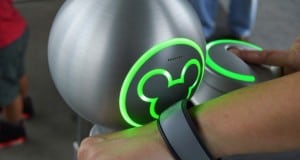 MagicBand touches the glowing Mickey icon at Disney World’s entrance, unlocking a magical start to your day’s Touring Plan.