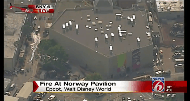 Aerial shot of EPCOT’s Norway Pavilion, with breaking news overlay announcing a fire incident at Walt Disney World.