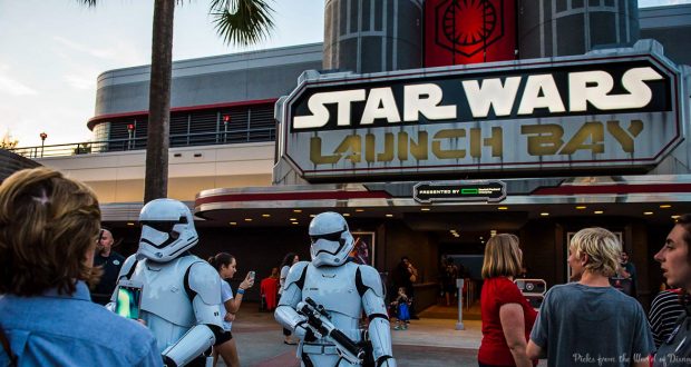 Fans and stormtroopers gather outside Star Wars Launch Bay at Hollywood Studios, a top experience for Disney park enthusiasts.