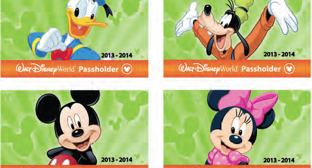 Set of four Disney World Annual Passholder cards (2013–2014) with Donald, Goofy, Mickey, and Minnie Mouse on display.