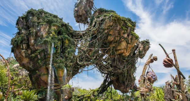 Pandora’s floating mountains draped in lush vines soar above guests exploring the immersive world at Disney’s Animal Kingdom.