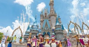 Beloved Disney characters dazzle before Cinderella Castle as fireworks light up Magic Kingdom’s sky, capturing pure park magic.
