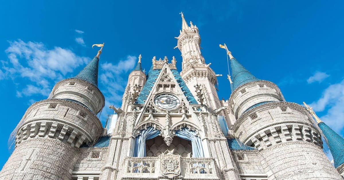 Cinderella Castle at Walt Disney World dazzles with its blue turrets, welcoming guests to a world of magic and adventure.