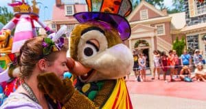 Chip and Dale share a magical interaction with a guest at Disney World, creating unforgettable vacation memories.
