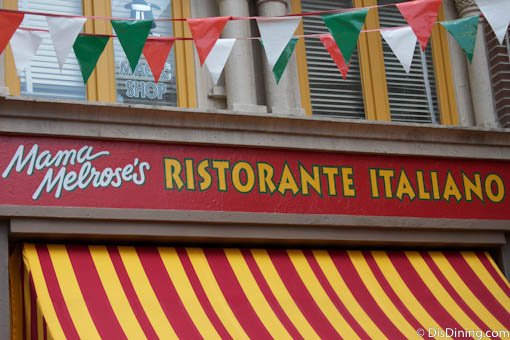 Mama Melrose’s Ristorante Italiano sign with festive bunting beckons guests to this classic Disney’s Hollywood Studios eatery.