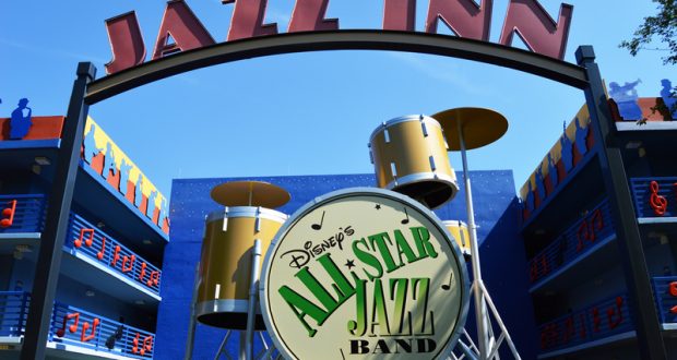 Disney’s All-Star Music Resort entrance with giant drums and the iconic “JAZZ INN” sign greeting guests at Walt Disney World.