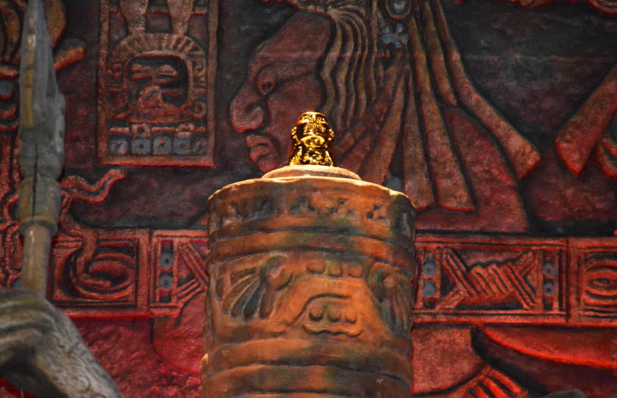 A golden idol crowns a carved pedestal, channeling Disney’s Hollywood Studios adventure vibes, framed by ancient stone carvings.