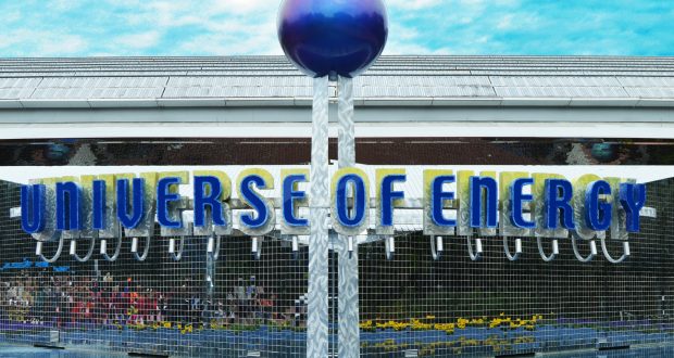 Universe of Energy welcomes Epcot fans, with its iconic sign, blue globe, and tiled fountain in Future World.