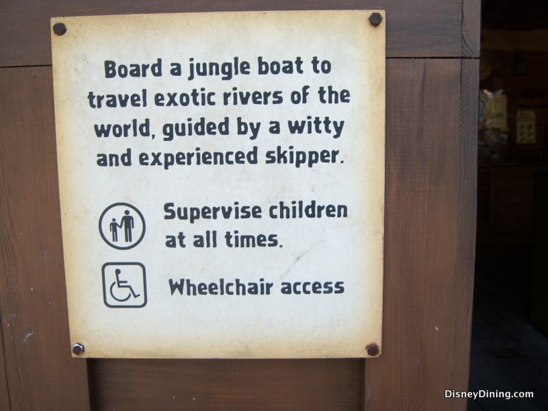 Jungle Cruise attraction sign featuring trivia, a reminder for child supervision, and details on wheelchair accessibility.