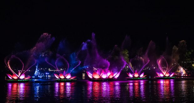 Dazzling illuminated lotus floats and fountains light up Animal Kingdom’s lake at night, creating unforgettable Disney magic.