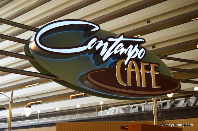 Contempo Café sign inside Disney’s Contemporary Resort, with glowing lights and balconies—a top Disney dining and hangout spot.